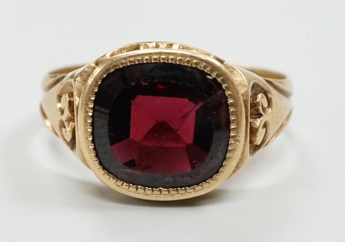 An early 20th century Austro-Hungarian? yellow metal and garnet set ring, size P/Q, gross weight 3.9 grams.